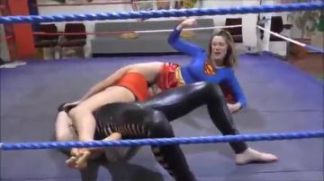 Lesbian Super Heroines Fighting in the ring